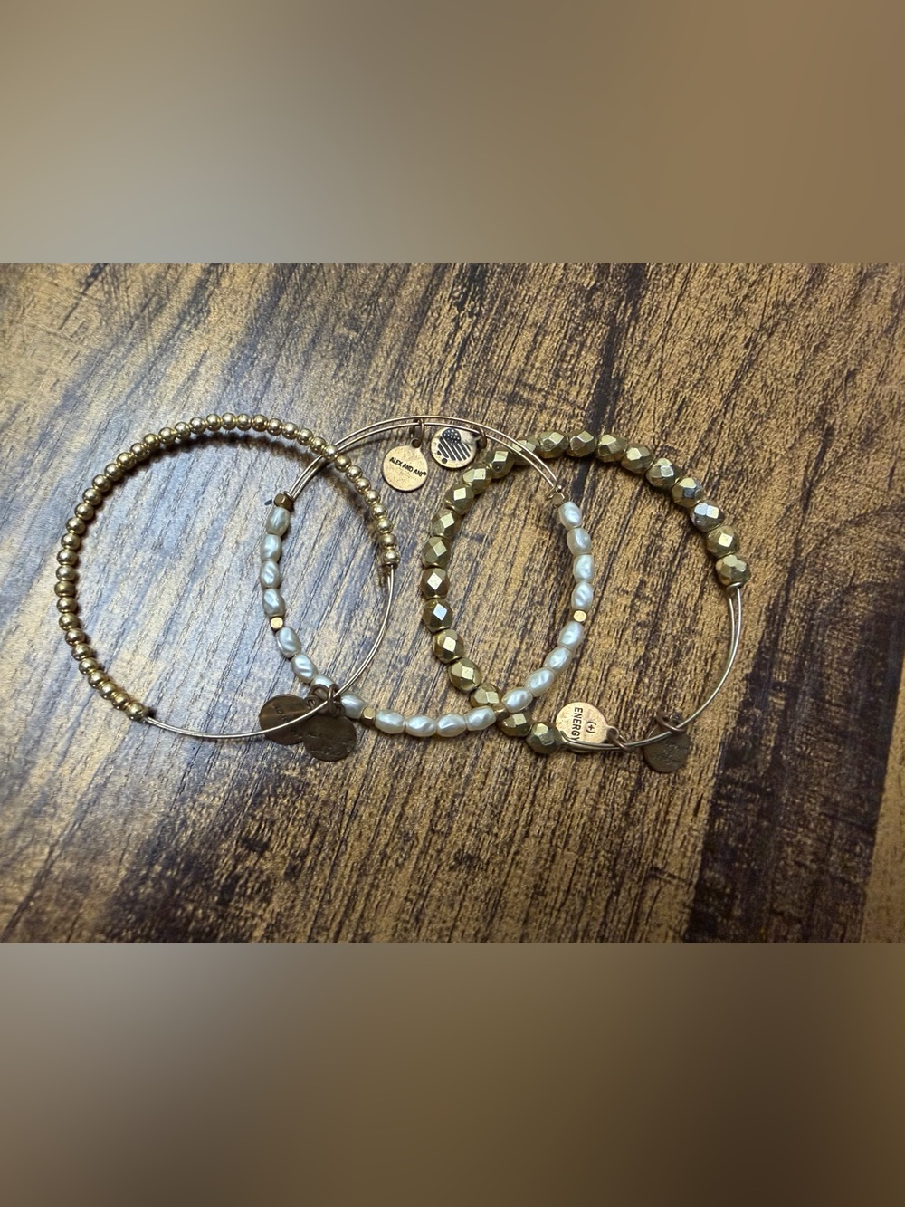 Set of three Alex and Ani bracelets